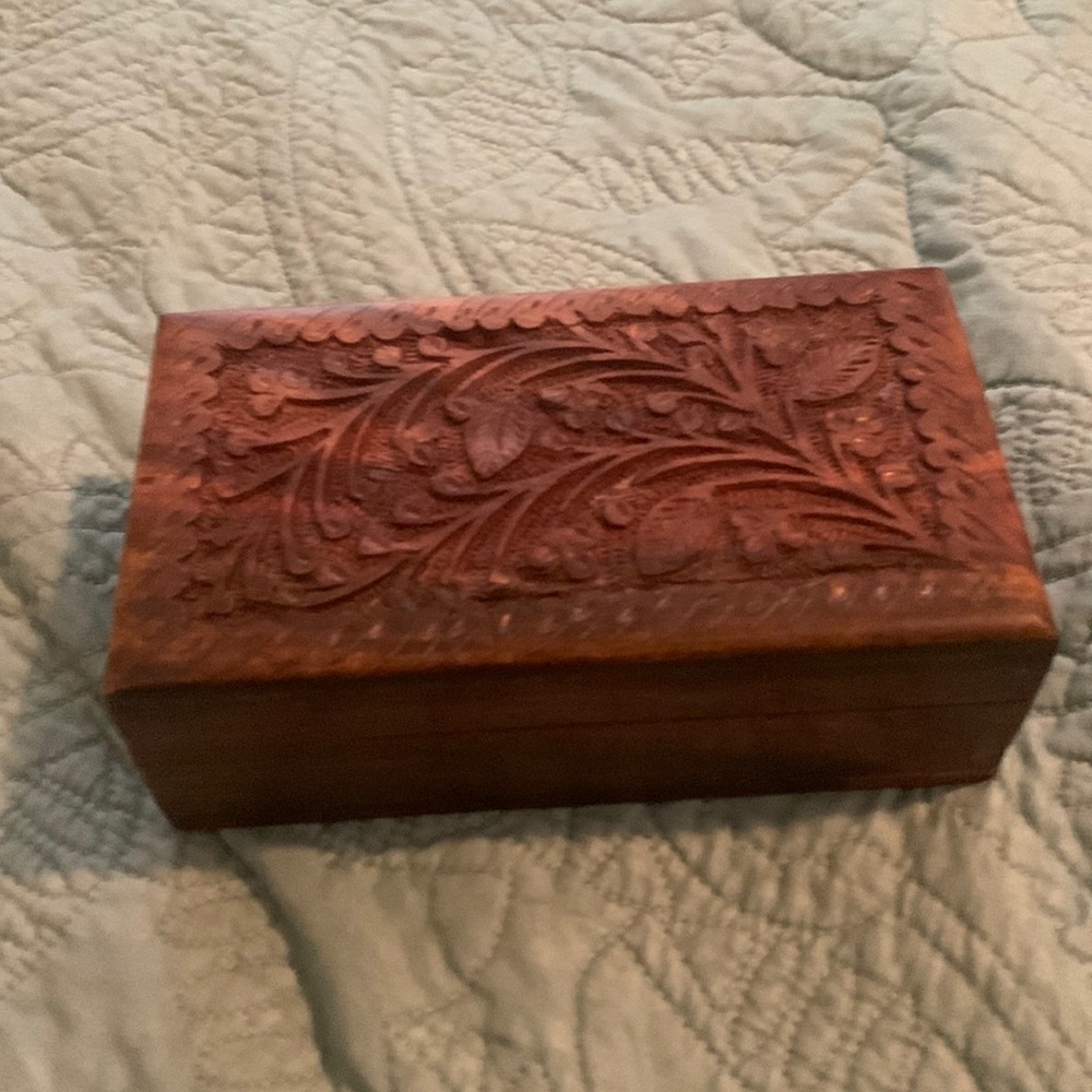 Small Carved wooden puzzle box with velvet lining